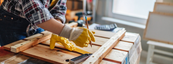 hands working on wood